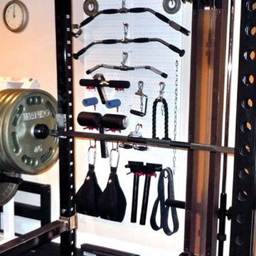 Wall Control’s heavy-duty metal pegboard is great for organizing gym and weigh