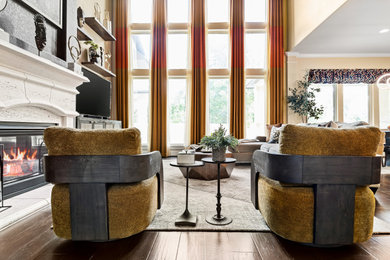 Living room - large transitional open concept dark wood floor living room idea in Houston with a stone fireplace and a tv stand