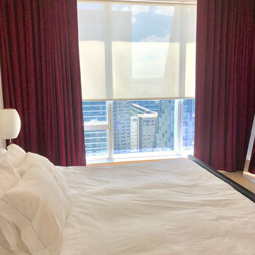 One West End – Rechargeable Shades and Burgundy Drapes