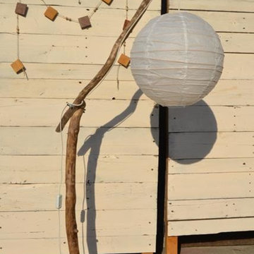 Lampe bois flôté, incrustation métal sur la base