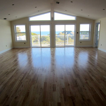 MONTAUK NEW CONSTRUCTION: 3 1/4" #1 RED OAK INSTALLED AND FINISHED NATURAL!