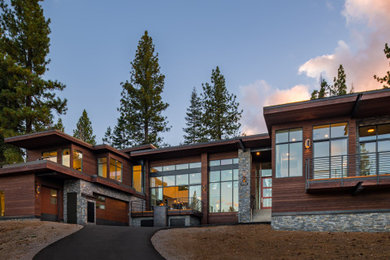 Example of a large trendy two-story wood house exterior design in Sacramento