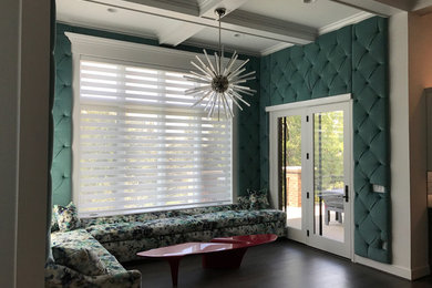 Example of an eclectic family room design in Detroit