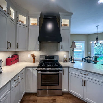White Kitchen with Black Range Hood and Taj Royale quartz Countertops
