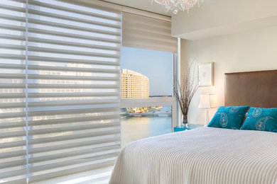 Mid-sized transitional master porcelain tile and beige floor bedroom photo in Phoenix with white walls