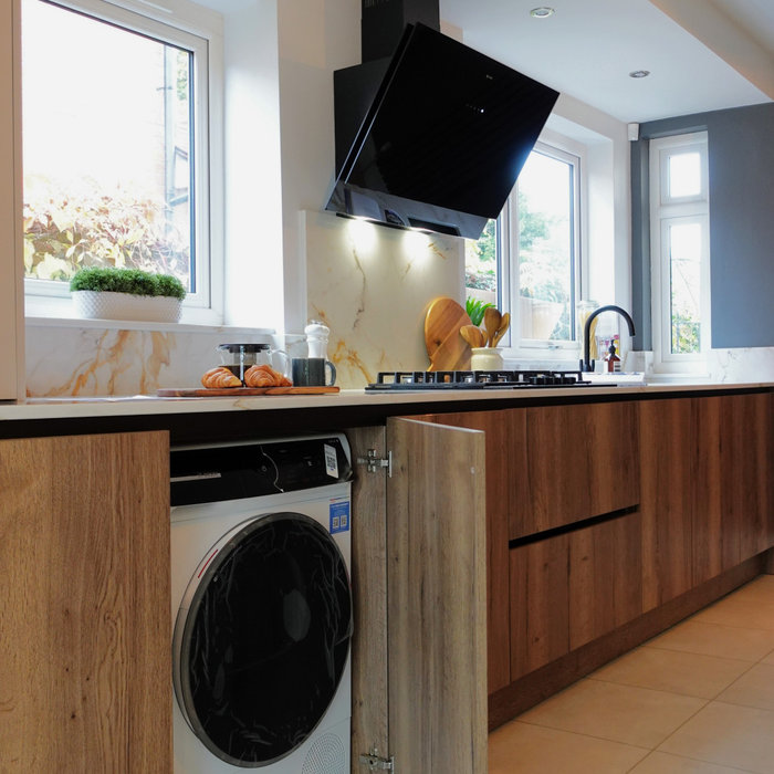 Eat-in kitchen - mid-sized contemporary galley vinyl floor and white floor eat-in kitchen idea in Other with a drop-in sink, flat-panel cabinets, dark wood cabinets, quartzite countertops, quartz back