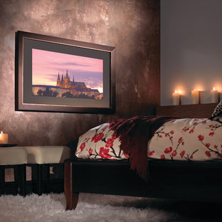 Foto di una camera degli ospiti etnica di medie dimensioni con pareti multicolore, moquette e pavimento multicolore