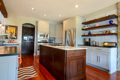 Enclosed kitchen - large eclectic u-shaped enclosed kitchen idea in Austin with an island