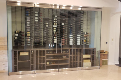 Wine cellar - small transitional wine cellar idea in Los Angeles