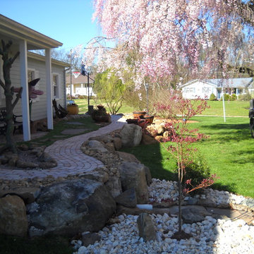 Hillsborough, NJ. Low Maintenance Landscape, Garden Art, Pool and FIre Pit