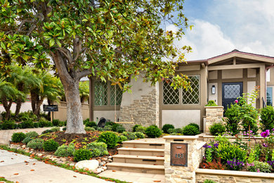 Coastal one-story house exterior idea in Orange County
