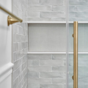 White Bathroom With Golden Finishes