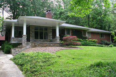 Mid-sized contemporary one-story stone exterior home idea in Atlanta with a hip roof