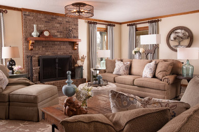 This is an example of a large traditional open concept family room in Atlanta with beige walls, porcelain floors, a standard fireplace, a brick fireplace surround and a freestanding tv.