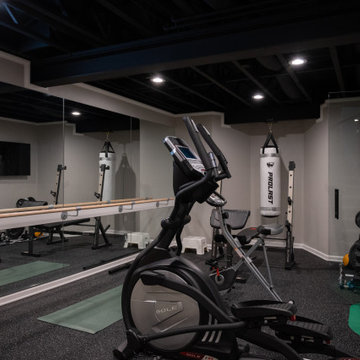 Finished Basement with Irish Themed Bar, Gym, Bathroom and Gamer Area in Canton,
