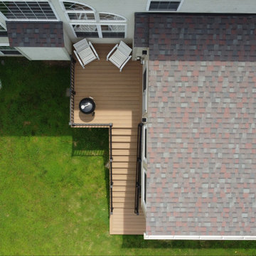Sunroom Addition with Barnwood Feature Wall and TimberTech Antique Leather Deck