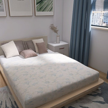 Cozy Minimalist Bedroom with Soft Blue Accents