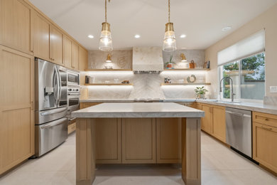 Kitchen - transitional u-shaped gray floor kitchen idea in San Diego with an undermount sink, shaker cabinets, light wood cabinets, gray backsplash, stone slab backsplash, stainless steel appliances, an island and gray countertops