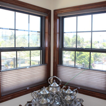 Elegant dining room with top down bottom up honeycomb shades