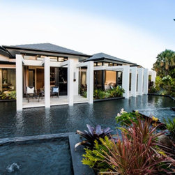 Tall narrow Breezway louvres feature in the lagoon house - Windows