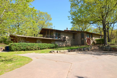 Example of a 1960s exterior home design in Other