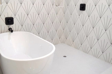 Walk-in shower - master black and white tile walk-in shower idea in San Diego with a niche