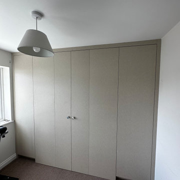 Murphy bed and wardrobes with concealed drawers