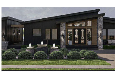 Inspiration for a mid-sized mid-century modern one-story exterior home remodel in Los Angeles with a mixed material roof