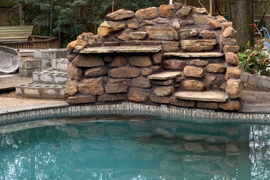 Inspiration for a traditional pool in Houston.
