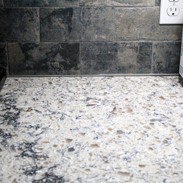 Updated Kitchen with Quartz Countertop, Tile Backsplash and Flooring