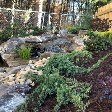Backyard water feature, how to use the lay of the land to your advantage!