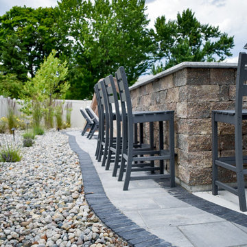 Outdoor Kitchen With Bar Seating + Landscaping