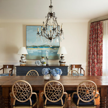 Modern Coastal Dining Room with Wooden Table and Wicker Seating
