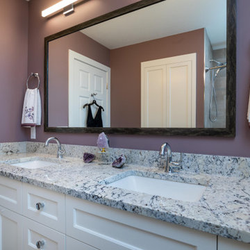 Modern Main Bathroom With a White Shaker Style Vanity and Lavender Walls