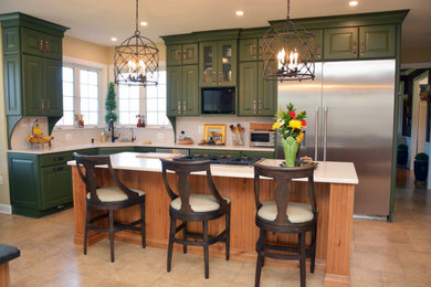 Large mountain style l-shaped beige floor eat-in kitchen photo in DC Metro with an undermount sink, raised-panel cabinets, green cabinets, quartz countertops, white backsplash, quartz backsplash, stainless steel appliances, an island and white countertops