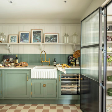 Kitchen renovation with crittall doors antique tiles