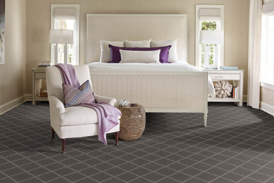 Inspiration for an eclectic carpeted and gray floor bedroom remodel in Houston