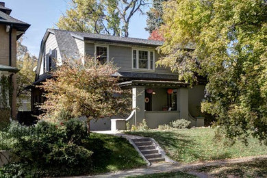Mid-sized trendy beige two-story exterior home photo in Denver