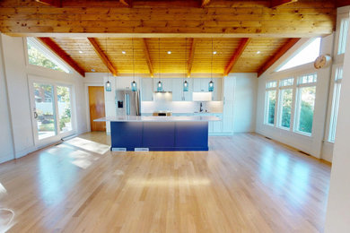 Example of a beach style home design design in Boston