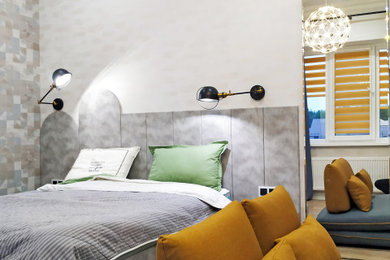 This is an example of a mid-sized scandinavian kids' room for boys in Other with beige walls, medium hardwood floors, beige floor and wallpaper.