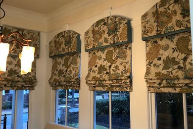 Arched Cornice with Motorized Roman Shades