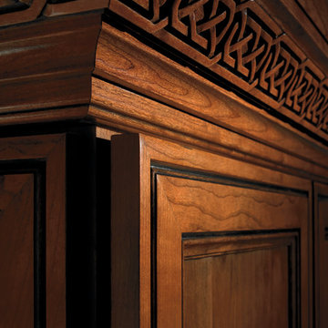 Closet door detial with intricate wooden moulding