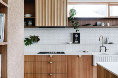 Inspiration for a mid-century modern brown floor kitchen remodel