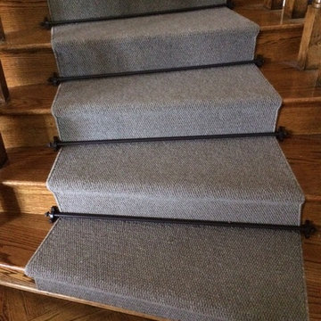 Stair runner with metal rods