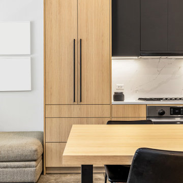 Sophisticated matte black and warm rift cut oak collision