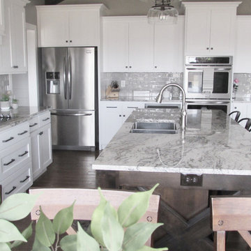 White Farmhouse Kitchen w/ Rustic Cathedral Ceilings