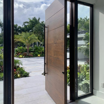 Experience the Security of a Hurricane-rated Pivot Door in Miami