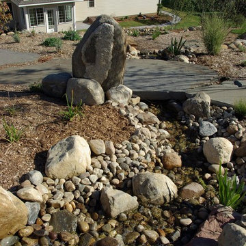 Boulder wall and pond