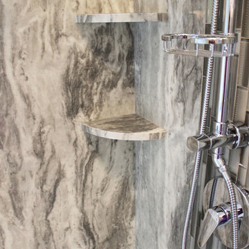Master Bathroom with Free Standing Tub, Quartz Countertop and Grey Tiled Shower