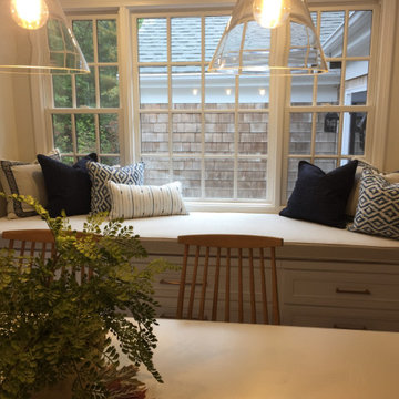 Custom bench seat cushion & pillows define this dining area perfectly!